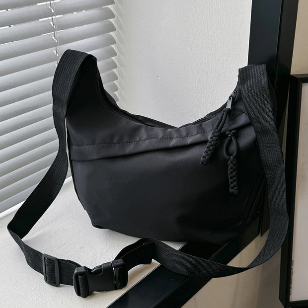 Neutral style tote bag with strap for carrying fitness items.